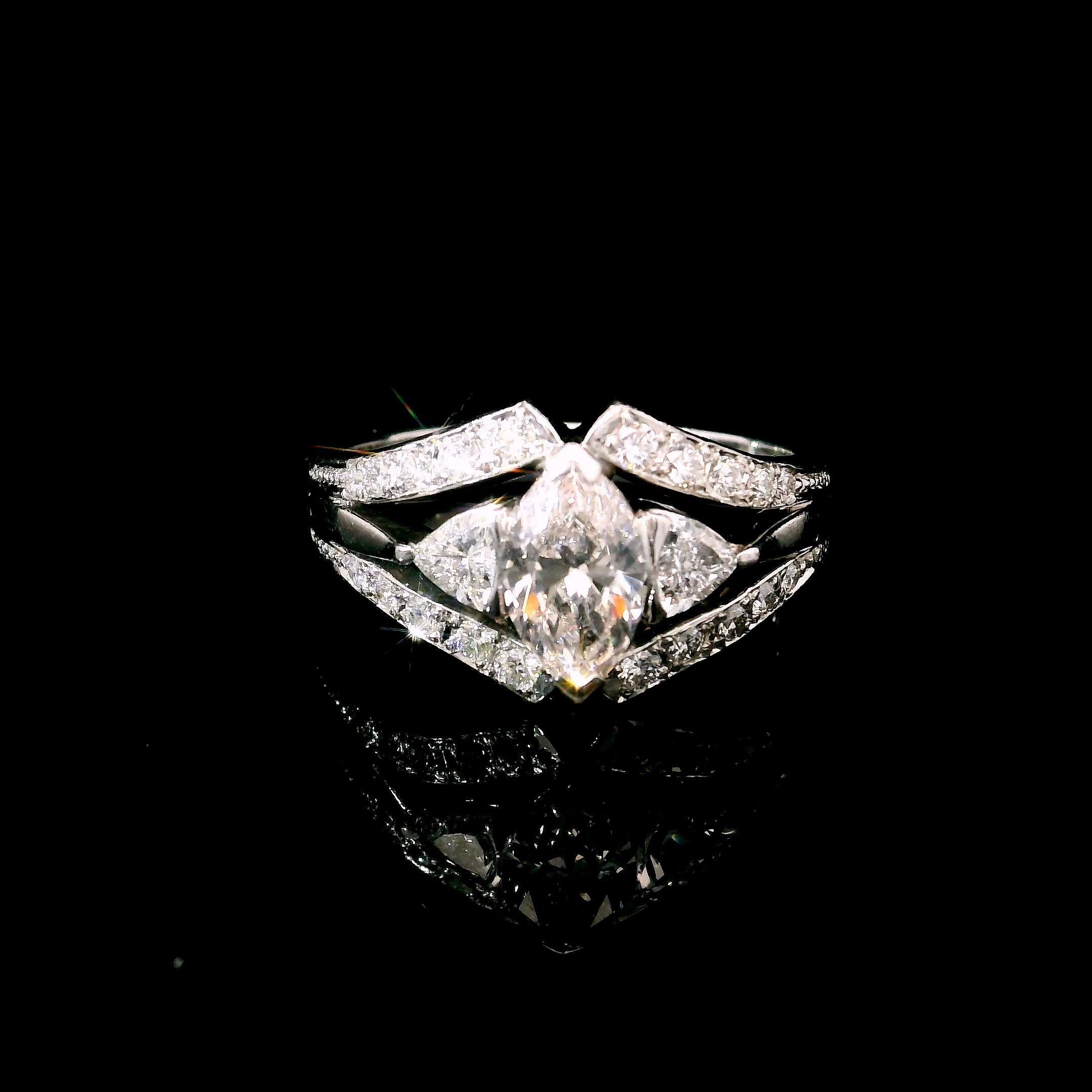 18kt white gold ring with diamonds
  
  Gold colour & karat: Platinum Ring 18kt
  Weight: 6.895 grams
  
  Set with-
  Stone type: Diamonds
  Shape: Round
  Carat: 0.377
  Colour: Fancy Pink
  Clarity: SI1
  
  Surrounding Stones: Diamonds
 1) White