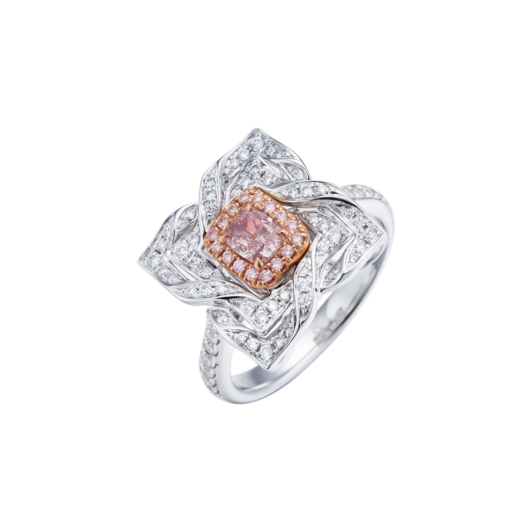0.37ct Natural Fancy Light Pink Cushion Shape Diamond Ring, a true marvel of nature, carefully set in 18kt gold. This ring is a celebration of elegance and sophistication, with a dash of rare and charming pink.

At the heart of this masterpiece is a