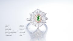 GIA Certified, 0.39cts Oval Natural Fancy Yellowish Green Diamond Ring in 18KT