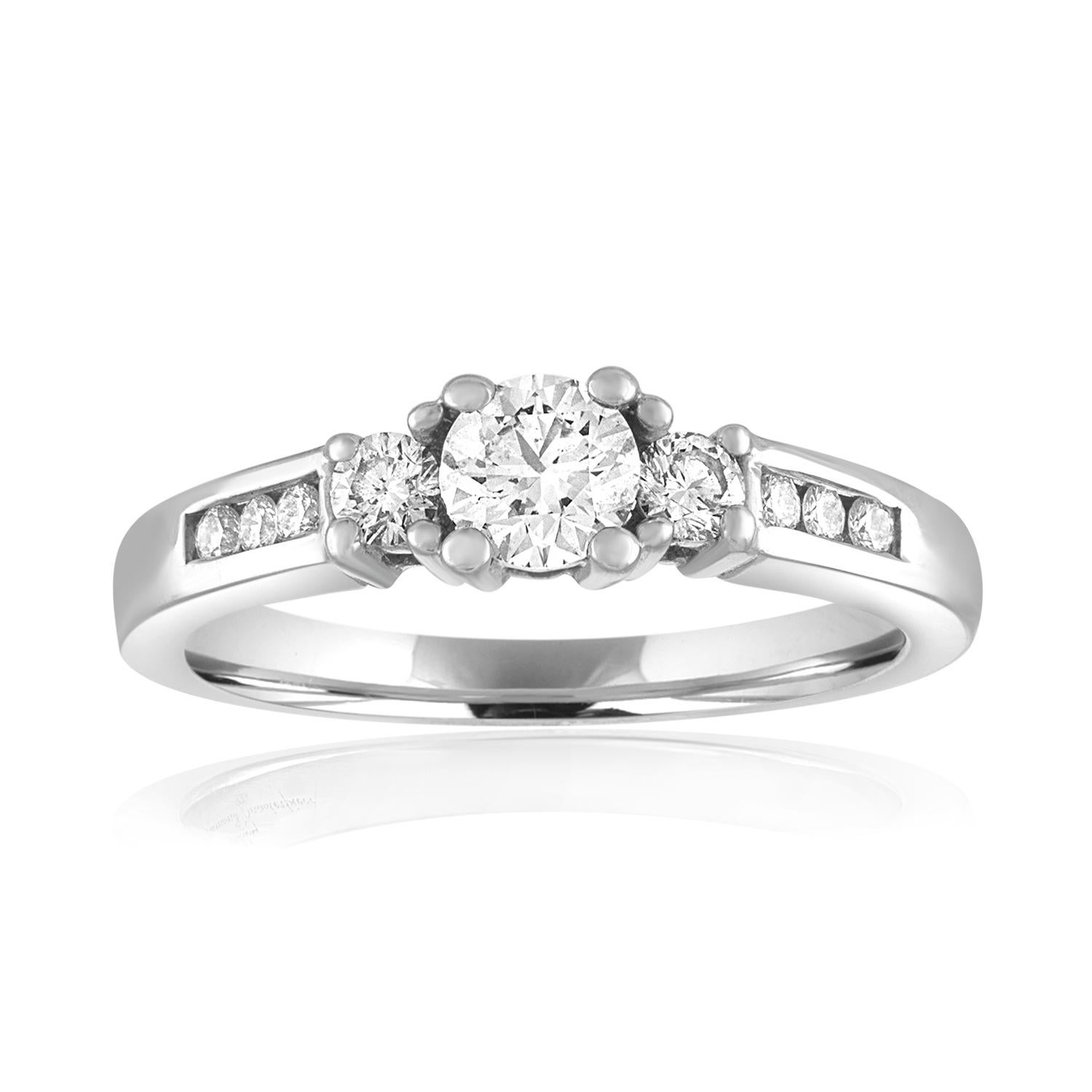 Beautiful Diamond Wedding Set
The Set is 18K White Gold
The Engagement Ring Center Stone is GIA Certified 0.40 Carat G SI2
The setting has 0.30Ct in Diamonds G VS 
The Engagement Ring is a size 7.25, sizable
The Engagement Ring weighs 4.5 grams
The