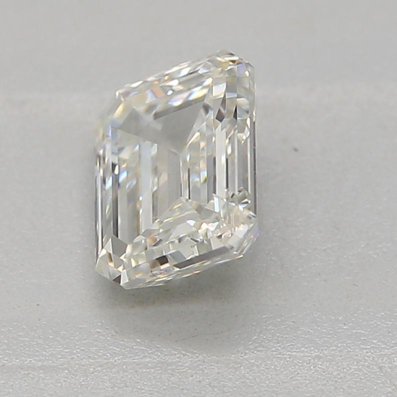 Emerald Cut GIA Certified 0.40 Carat Faint Yellow Green VVS1 Clarity Diamond For Sale