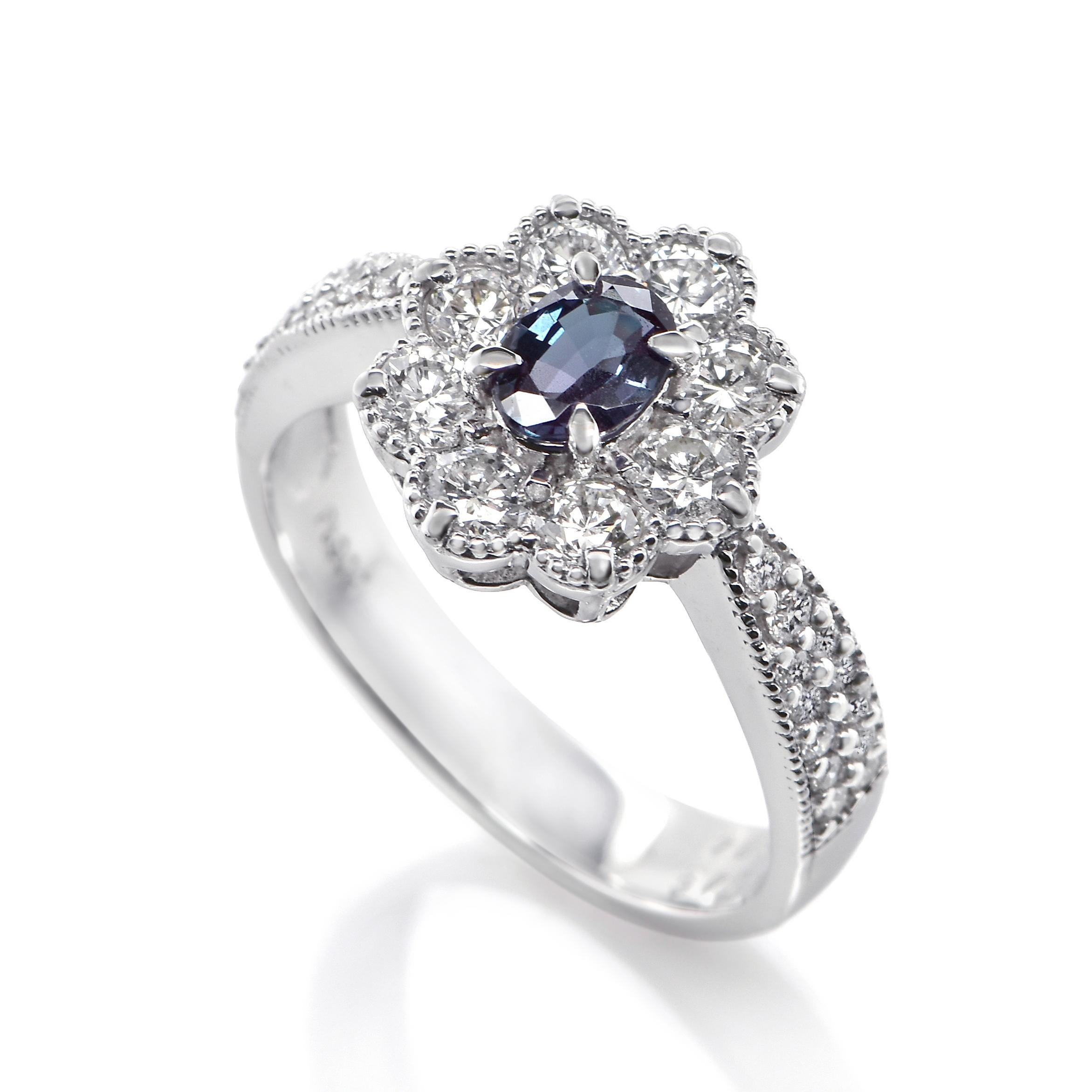 A gorgeous ring featuring GIA Certified 0.43 Carat, Nature Brazilian Alexandrite and 0.84 Carats of Diamond Accents set in Platinum. Alexandrites produce a natural color-change phenomenon as they exhibit a Bluish Green Color under Fluorescent Light