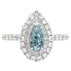 Anello con diamante certificato GIA da 0,43 carati, colore Fancy Light Greenish Blue, purezza VS2