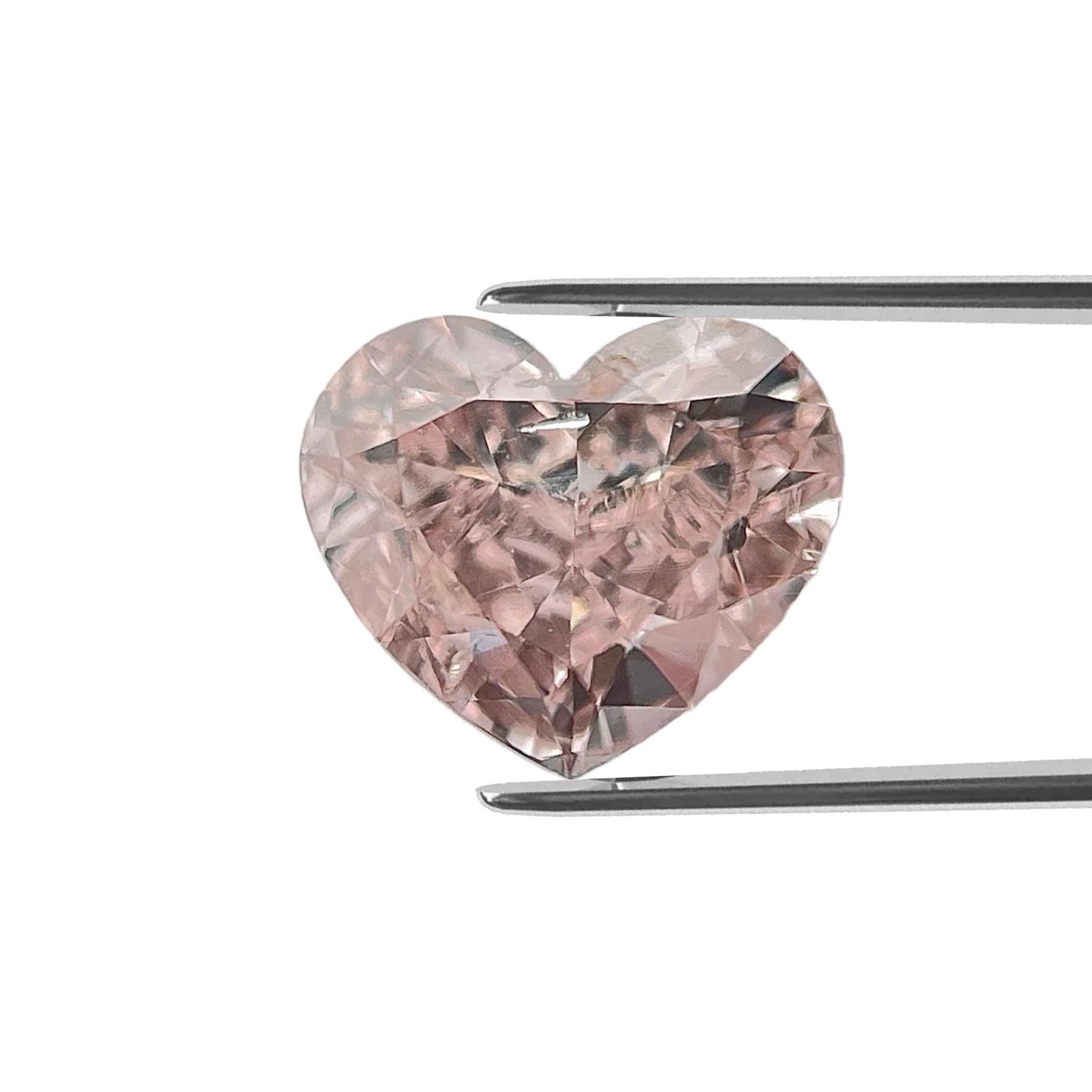 ITEM DESCRIPTION

ID #: NYC57370
Stone Shape: HEART MODIFIED BRILLIANT
Diamond Weight: 0.43ct
Clarity: SI2
Color: Fancy Pink Brown
Cut:	Excellent
Measurements: 4.57 x 5.40 x 2.49 mm
Symmetry: Very Good
Polish: Very Good
Fluorescence: None
Certifying