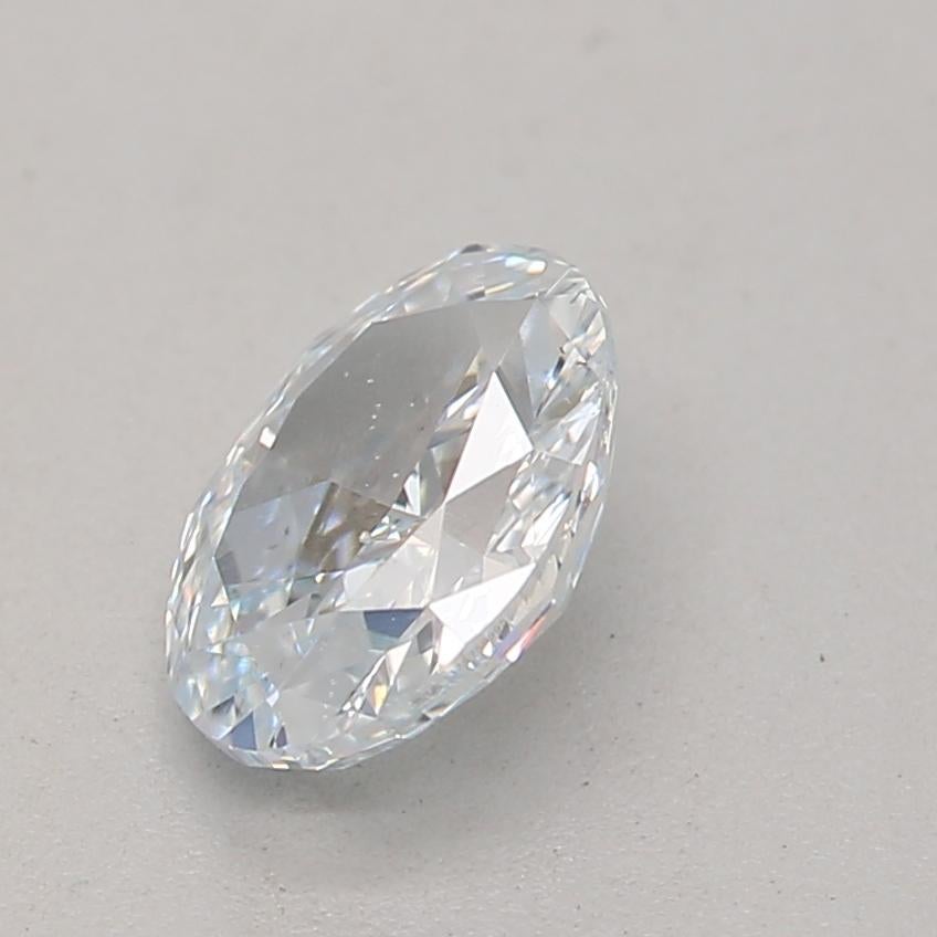 Oval Cut GIA Certified 0.45 Carat Light Blue SI1 Clarity Diamond For Sale