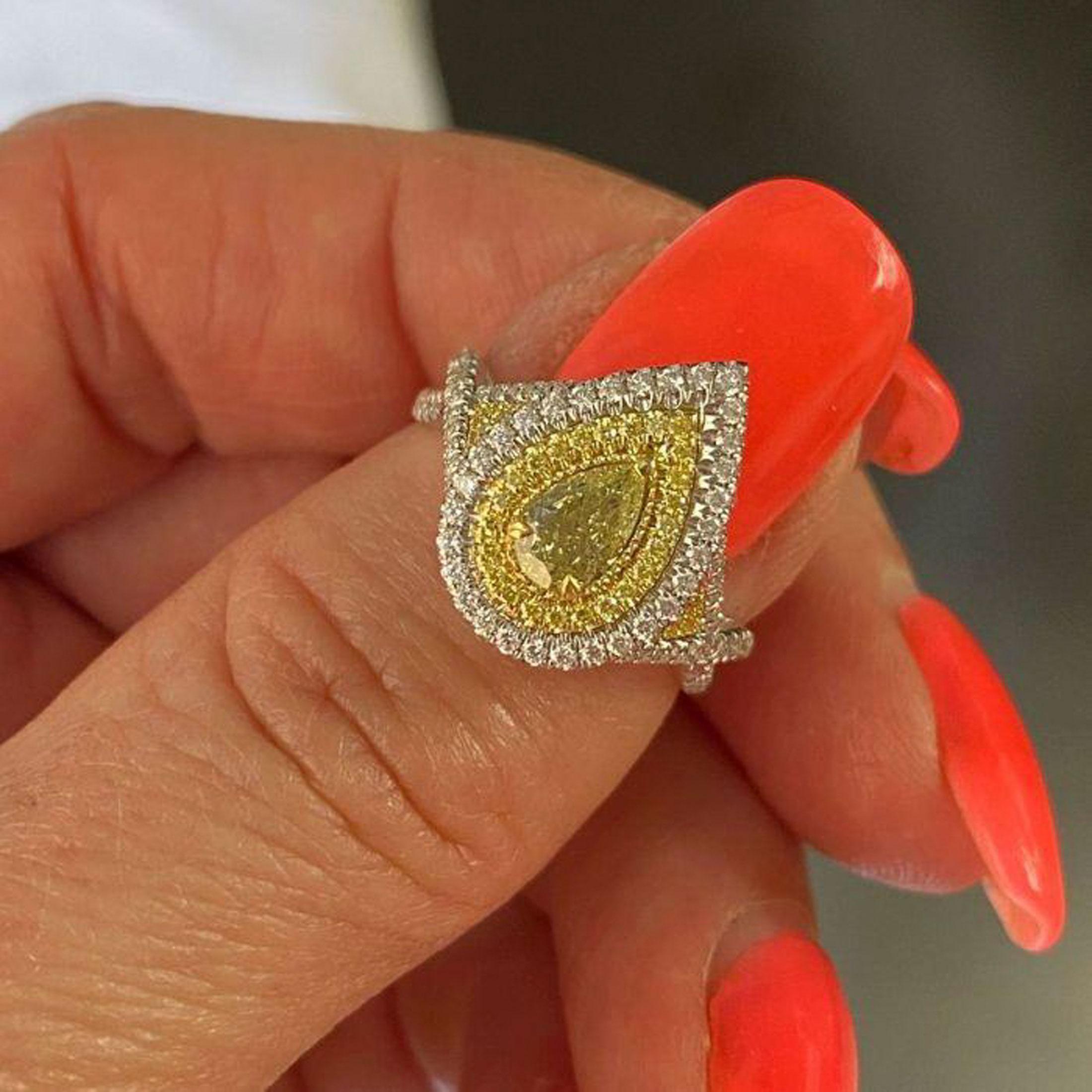 GIA Certified 0.45 Ct Fancy Intense Yellow Pear Shape Diamond Engagement Ring In New Condition For Sale In New York, NY