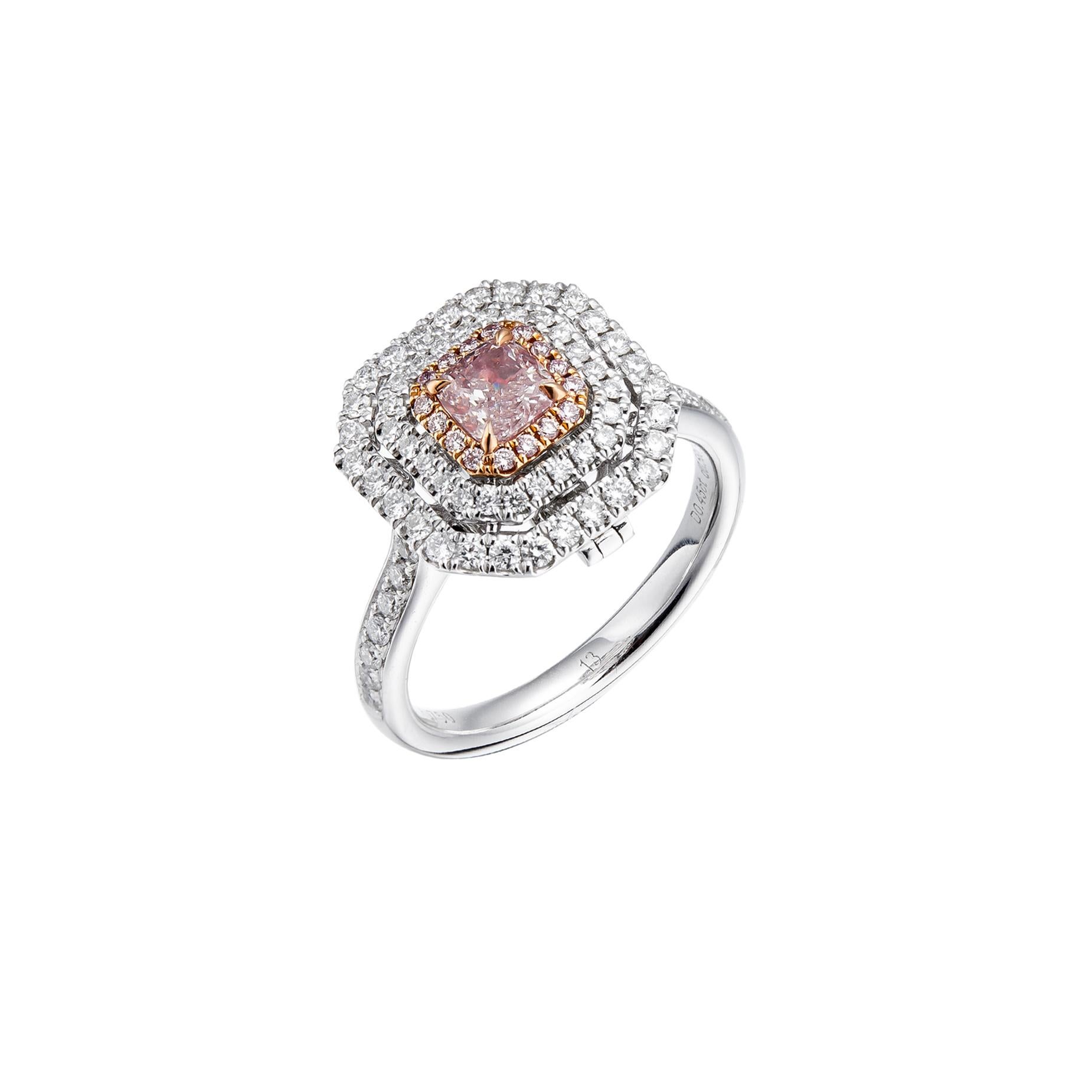 GIA-certified 0.45 carat natural pink diamond, mounted on high-quality 18KT gold. The pink diamond is surrounded by a geometrically set halo of small brilliant cut pink diamonds, adding depth and dimension to the design.

The pink diamond halo is