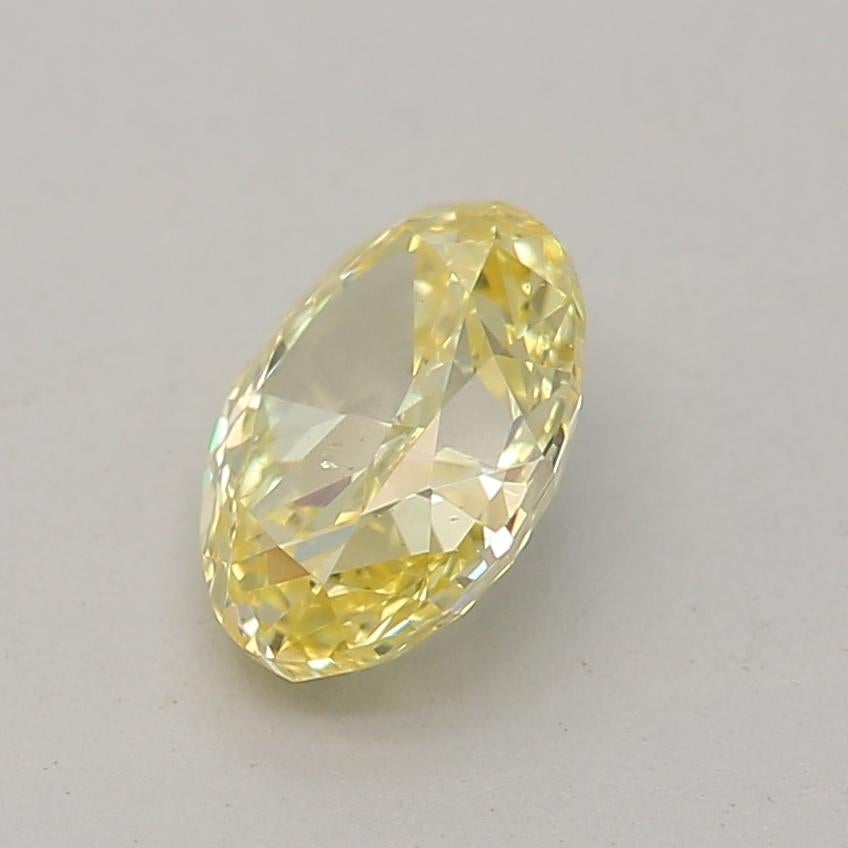 Oval Cut GIA Certified 0.46 Carat Fancy Intense Yellow SI1 Clarity Diamond For Sale