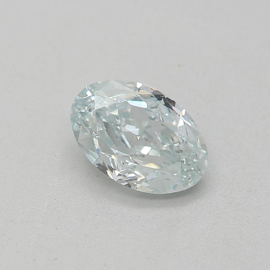Oval Cut GIA Certified 0.47 Carat Fancy Light Bluish green VS1 Clarity Diamond For Sale