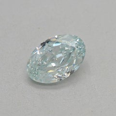 GIA Certified 0.47 Carat Fancy Light Bluish green VS1 Clarity Diamond