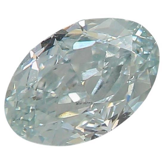 GIA Certified 0.47 Carat Fancy Light Bluish green VS1 Clarity Diamond For Sale