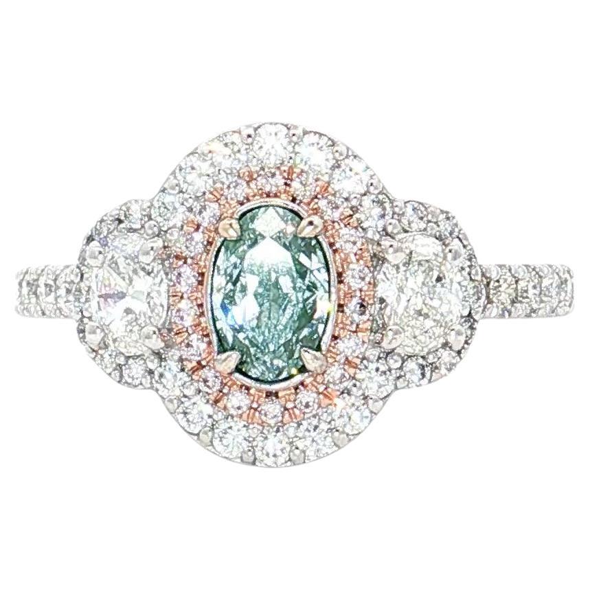 GIA Certified 0.47 Carat Fancy Light Bluish Green VS1 Clarity Diamond Ring