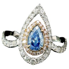 GIA Certified 0.47 Carat Fancy light Greenish Blue VVS1 Clarity Diamond Ring