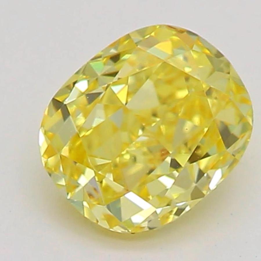 Certificate: GIA
Report Number: 2165787719
Shape And Cut: Cushion
Carat Weight: 0.48 carat
Measurements: 5.04 x 4.24 x 2.75 mm
Color Grade: Fancy Vivid Yellow

FEATURES OF THE DIAMOND:

This fancy vivid yellow diamond is a rare and highly prized
