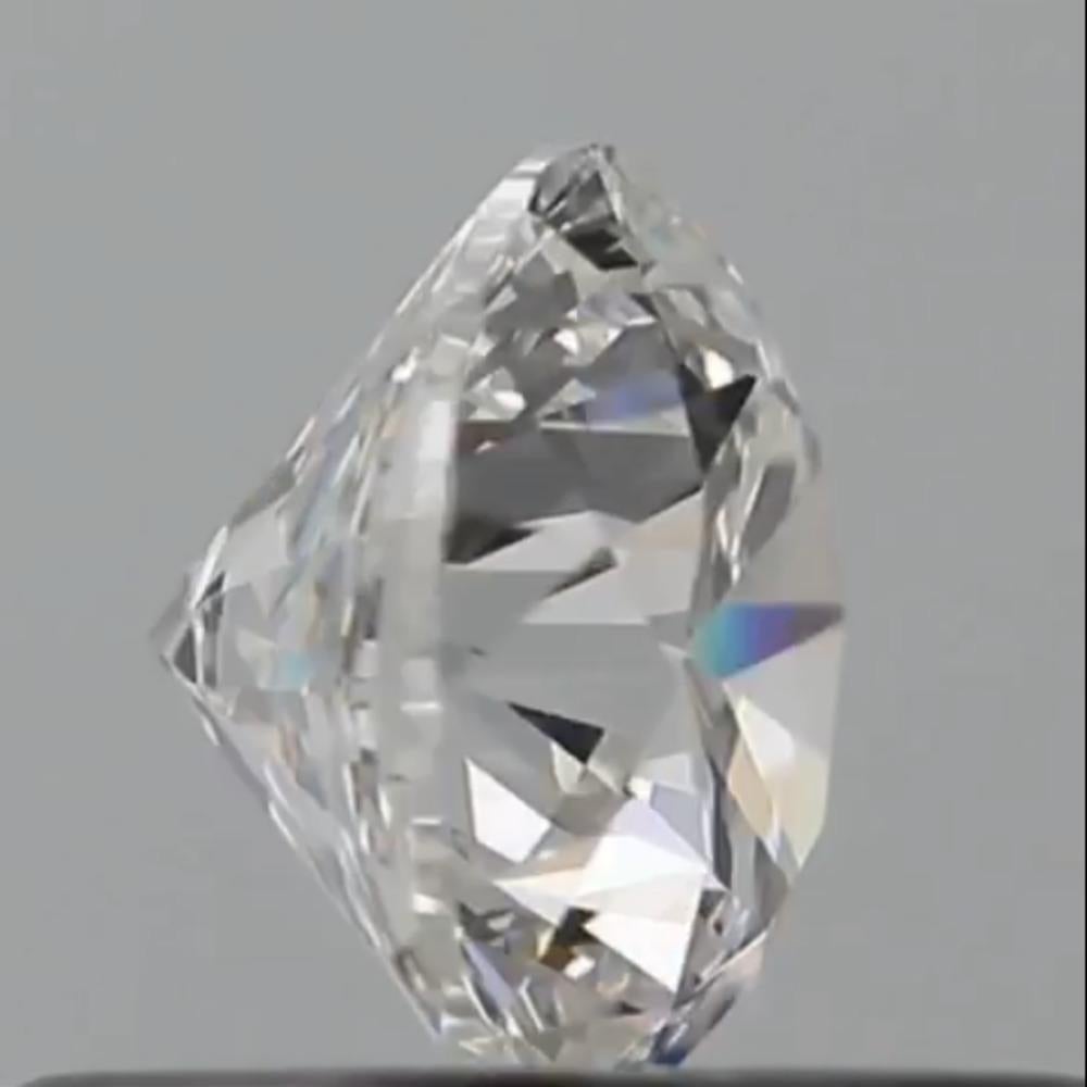 Round Cut GIA Certified 0.50 Carat E Colour VVS1 Clarity Diamond For Sale