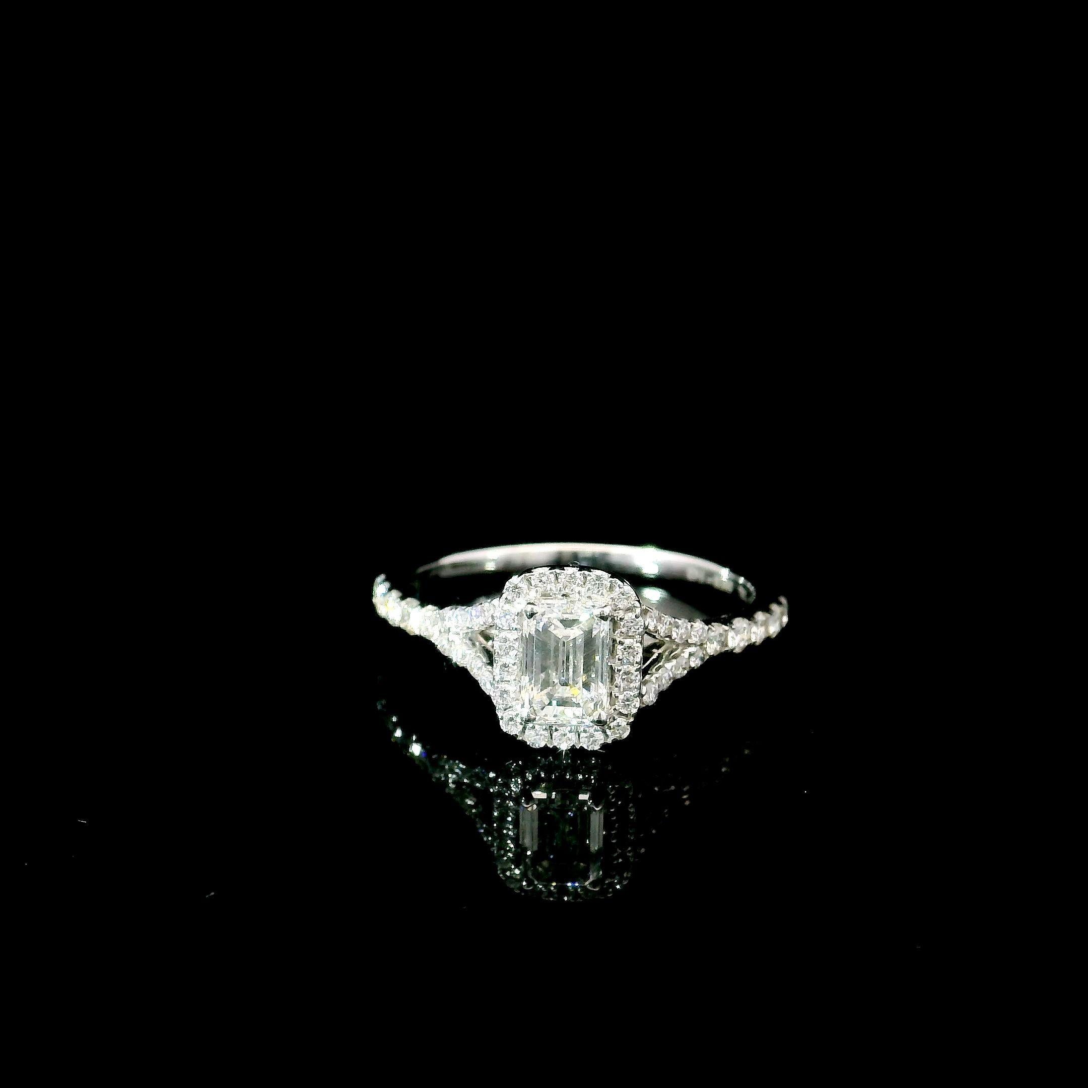 18kt white gold ring with diamonds
  
  Gold colour & karat: White gold 18kt
  Weight: 2.36 grams
  
  Set with-
  Stone type: Diamonds
  Shape: Emerald
  Carat: 0.50 ct
  Colour: F Colour
  Clarity: VS2
  
  Surrounding Stones: Diamonds
 1) White
