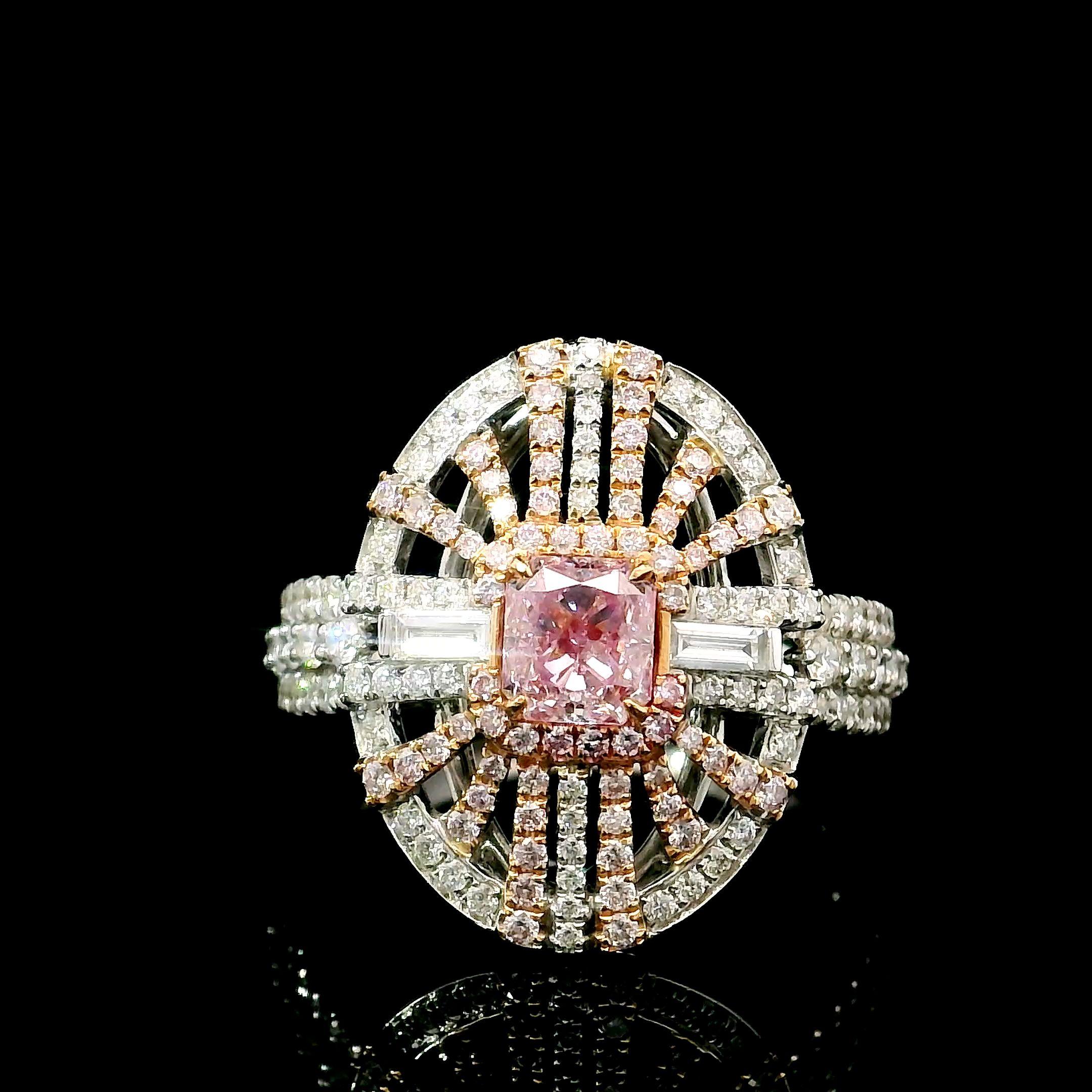 18kt white gold ring with diamonds
  
  Gold colour & karat: White gold 18kt
  Weight: 5.252 grams
  
  Set with-
  Stone type: Diamonds
  Shape: Cushion
  Carat: 0.50
  Colour: Faint Pink  
  Clarity: VS2
  
  Surrounding Stones: Diamonds
1) Side