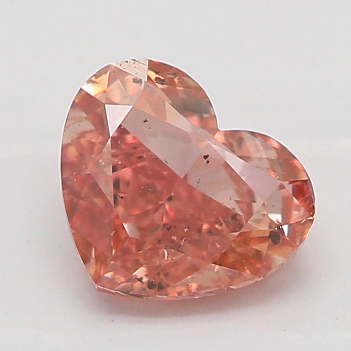 Certificate: GIA
Report Number: 6252059987
Shape And Cut: Heart
Carat Weight: 0.50 carat
Measurements: 4.49 X 5.37 X 2.72 mm
Color Grade: Fancy Brown Pink

FEATURES OF THE DIAMOND:

This heart-shaped diamond is a unique and romantic cut that