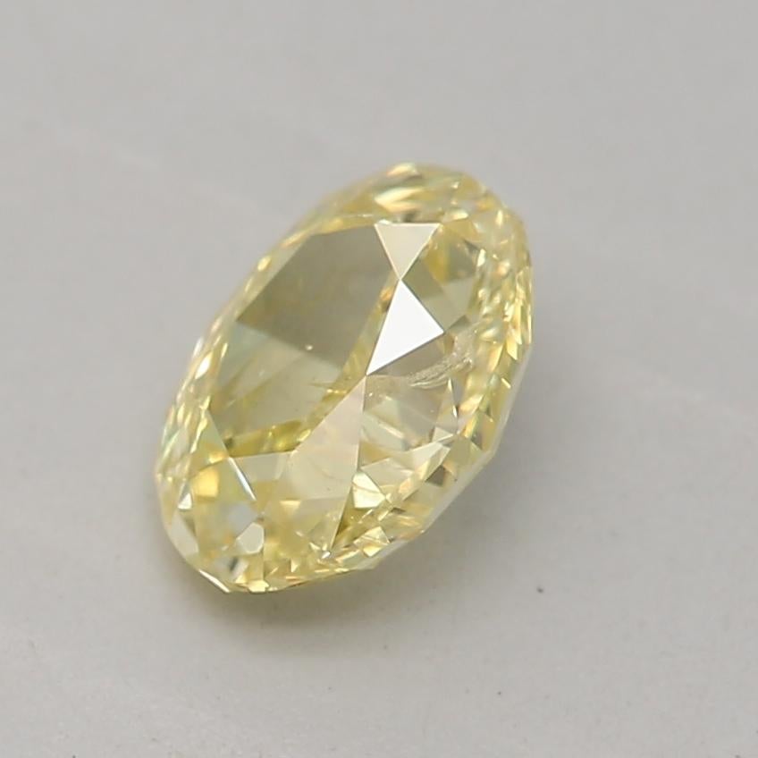 Oval Cut GIA Certified 0.50 Carat Fancy Intense Yellow I1 Clarity Diamond For Sale