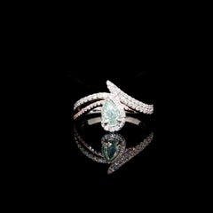 GIA Certified 0.50 Carat Fancy Light Blue Green VS1 Clarity Diamond Ring
