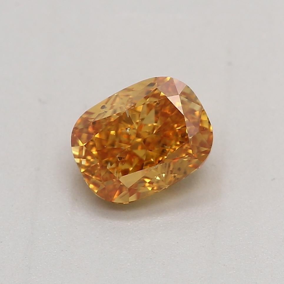 Certificate: GIA 
Report Number: 1449627965
Shape And Cut: Cushion
Carat Weight: 0.50 carat
Measurements: 4.98 x 3.81 x 2.94 mm
Color Grade: Fancy Vivid Yellow Orange

FEATURES OF THE DIAMOND:

This Fancy Vivid Yellow Orange Diamond is an