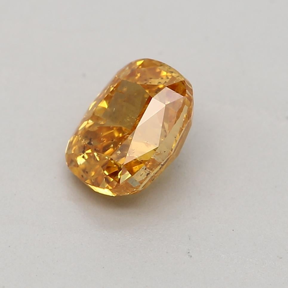 Cushion Cut GIA Certified 0.50 Carat Fancy VIvid Yellow Orange I1 Clarity Diamond For Sale