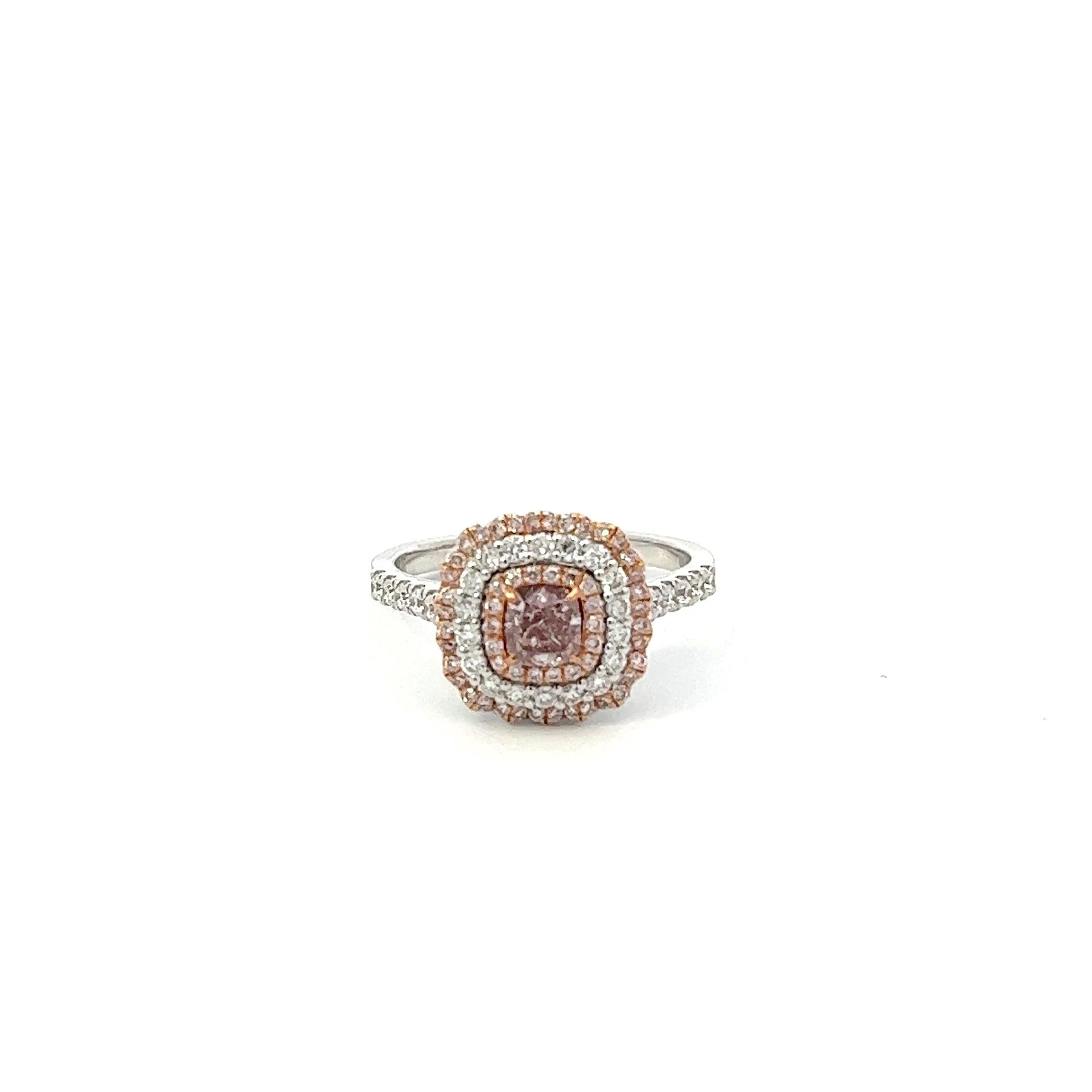 Center: 0.50ct Fancy Brownish Pink Cushion I2 GIA# 2407850499
Setting: 18k White Gold 0.60ctw Pink and White Diamonds

An extremely rare and stunning natural pink diamond center. Pink Diamonds account for less than 0.01% of all diamonds mined in the