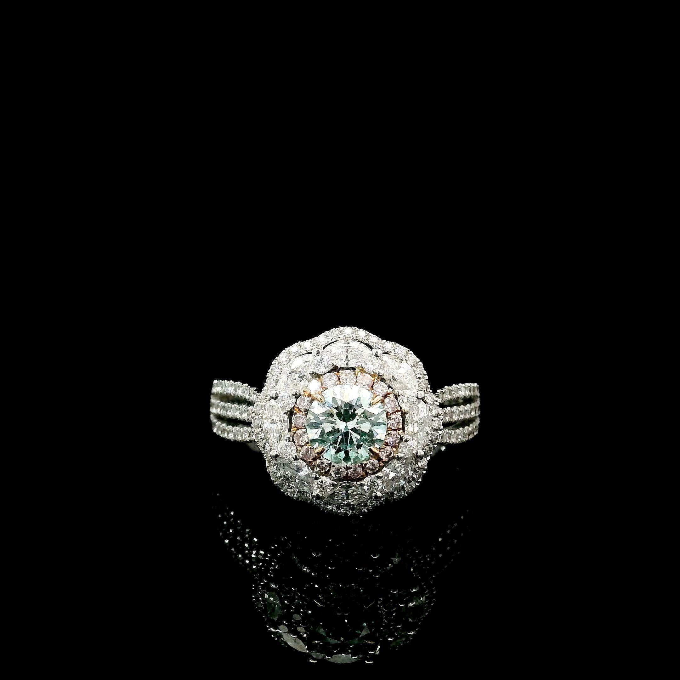18kt white gold ring with diamonds
  
  Gold colour & karat: White gold 18kt
  Weight: 4.45 grams
  
  Set with-
  Stone type: Diamonds
  Shape: Round
  Carat: 0.50
  Colour: Very Light Green Yellow  
  Clarity: SI1
  
  Surrounding Stones: