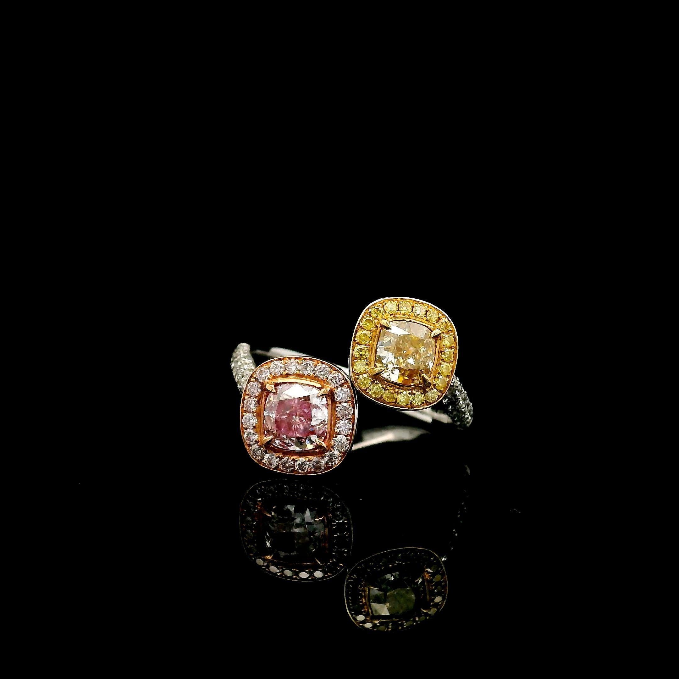 18kt white gold ring with diamonds
  
  Gold colour & karat: White gold 18kt
  Weight: 3.89 grams
  
  Set with-
  Stone type: Diamonds
  Shape: Cushion / Cushion
  Carat: 0.50 / 0.53
  Colour: Fancy Light Brownish Yellow / Faint Pink
  Clarity: SI1
