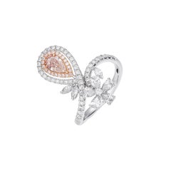 GIA Certified, 0.50ct Light Pinkish Brown Natural Pear Shape Solitaire Diamond.