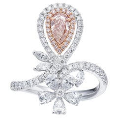 GIA Certified, 0.50ct Light Pinkish Brown Natural Pear Shape Solitaire Diamond. 