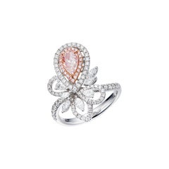 GIA Certified, 0.50ct Natural Faint Pinkish Brown Pear Shape Diamond Solitaire.