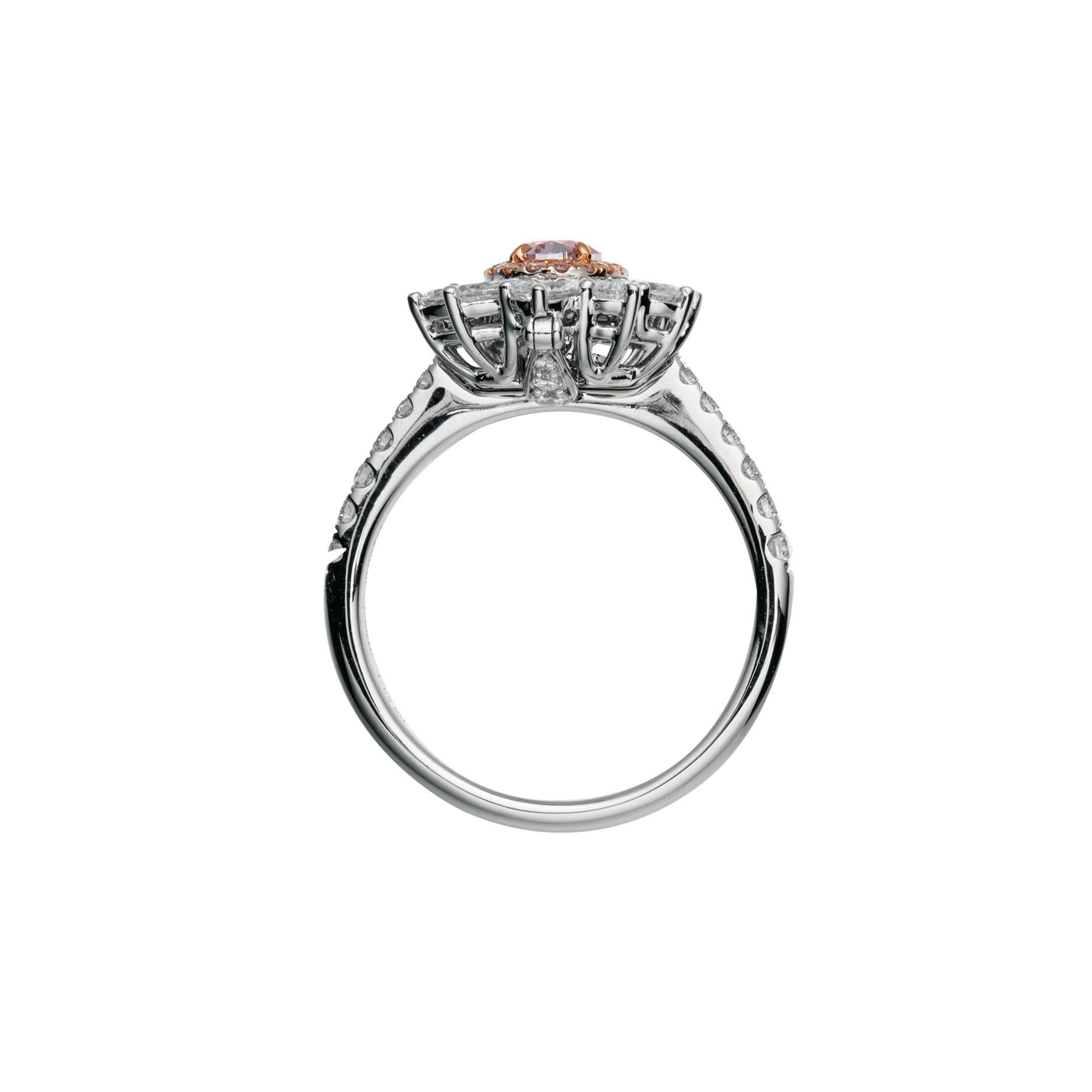 oval pink diamond engagement ring