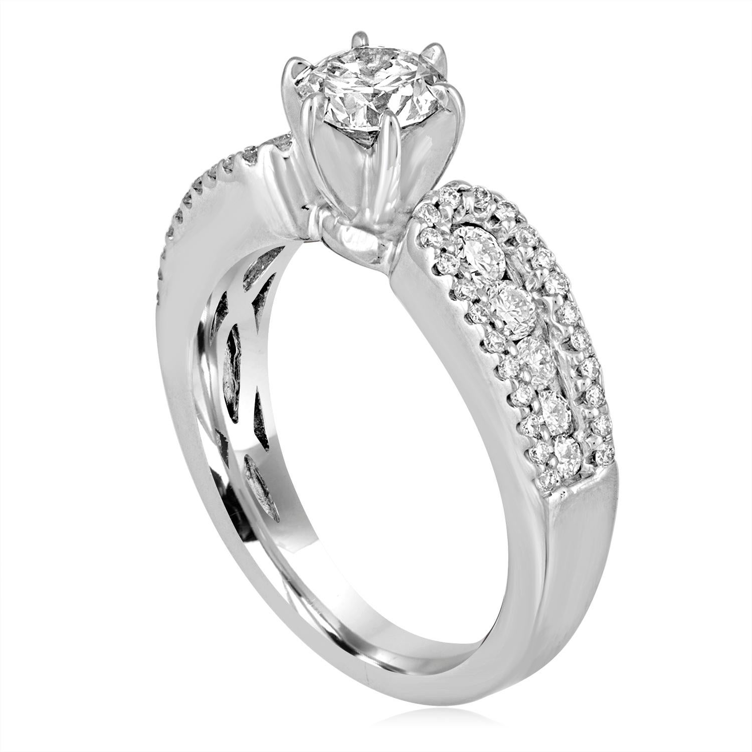 The ring is 14K White Gold
The center stone is a Round 0.51 Carats E VS2 GIA Certified
The setting has 0.70 Carats in White Diamonds G/H SI
The ring is a size 4.5, sizable.
The ring weighs 4.4 grams.
We can resize free of charge, the ring becomes