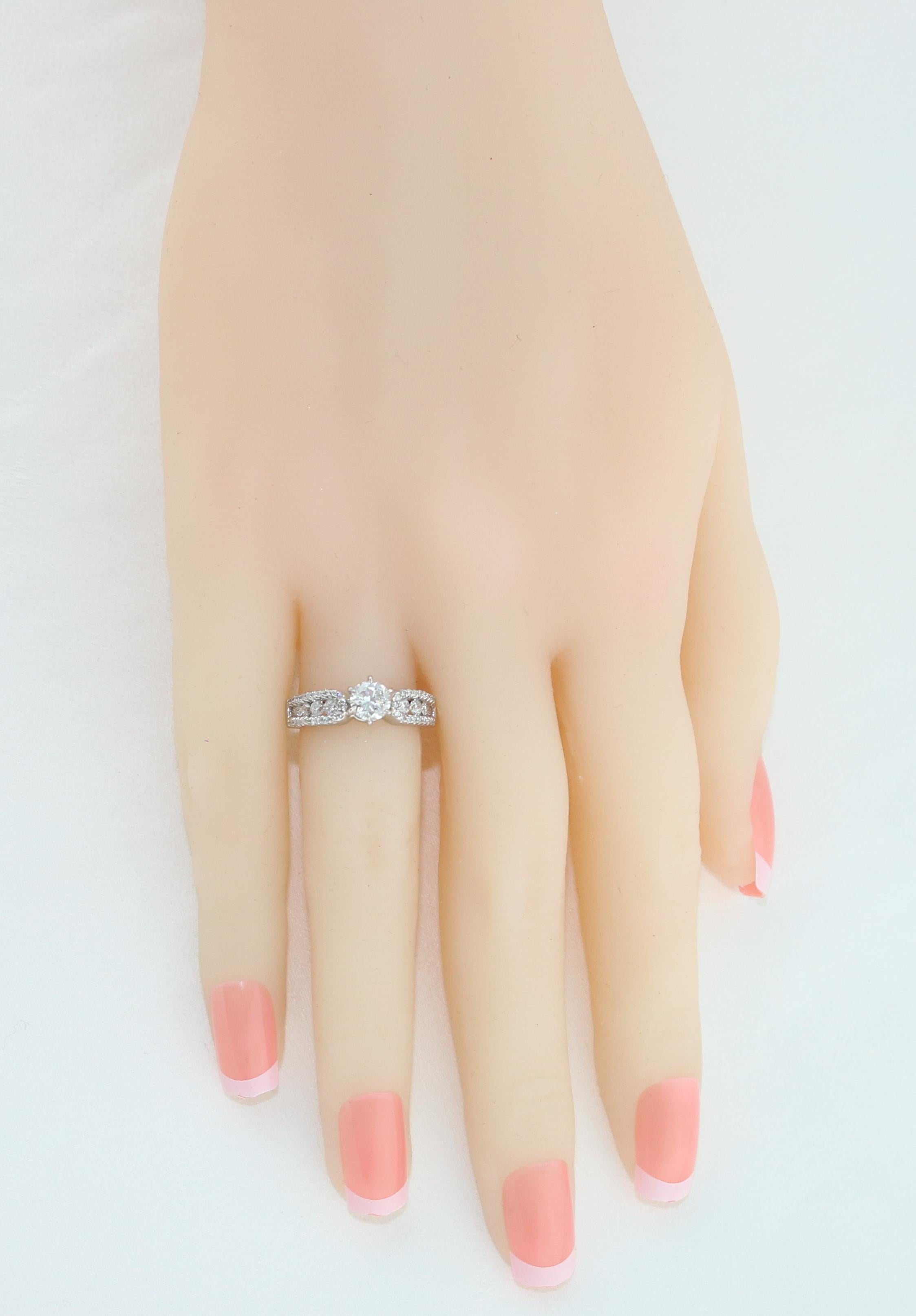 Women's GIA Certified 0.51 Carat E VS2 Round Diamond Gold Engagement Ring For Sale
