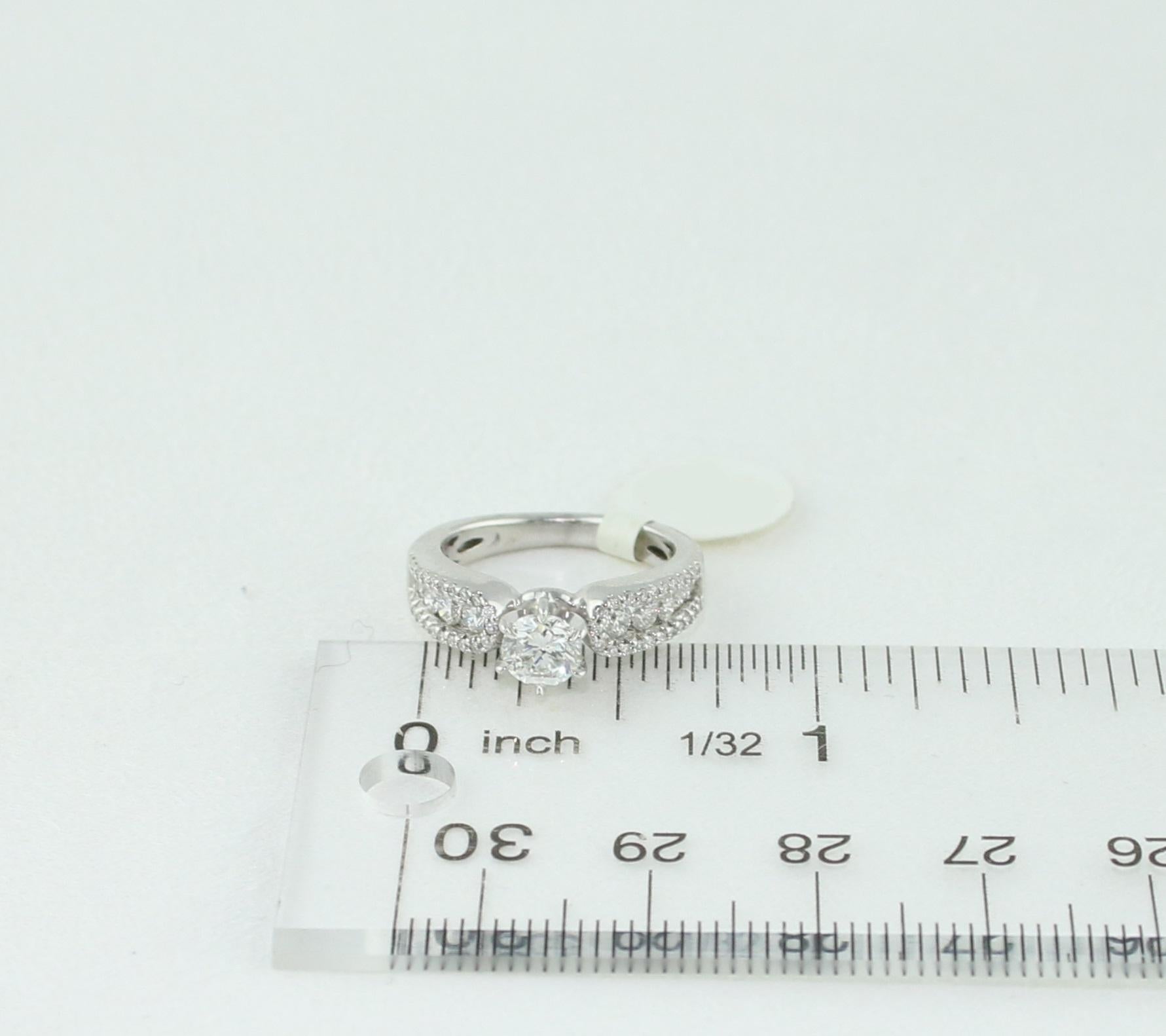 GIA Certified 0.51 Carat E VS2 Round Diamond Gold Engagement Ring For Sale 2