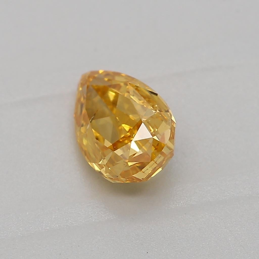 Pear Cut GIA Certified 0.51 Carat Fancy Intense Orangy Yellow SI2 Clarity Diamond For Sale