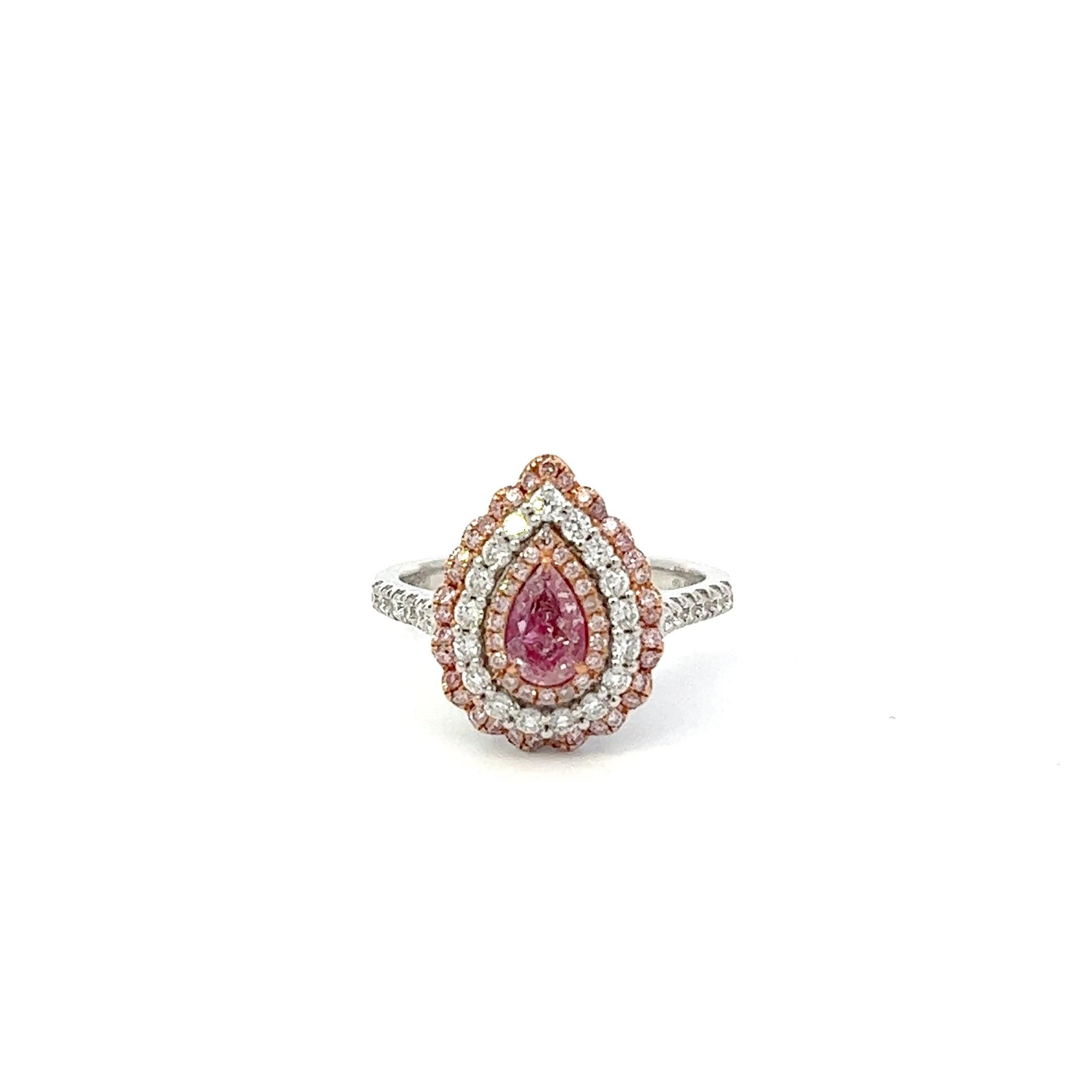Center: 0.51ct Fancy Brownish Pink Pear I2 GIA# 7391869017
Setting: 18k White Gold 0.69ctw Pink and White Diamonds

An extremely rare and stunning natural pink diamond center. Pink Diamonds account for less than 0.01% of all diamonds mined in the