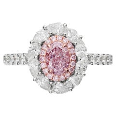 GIA Certified, 0.51ct Natural Fancy Light Purplish Pink Oval shape Diamond Ring.