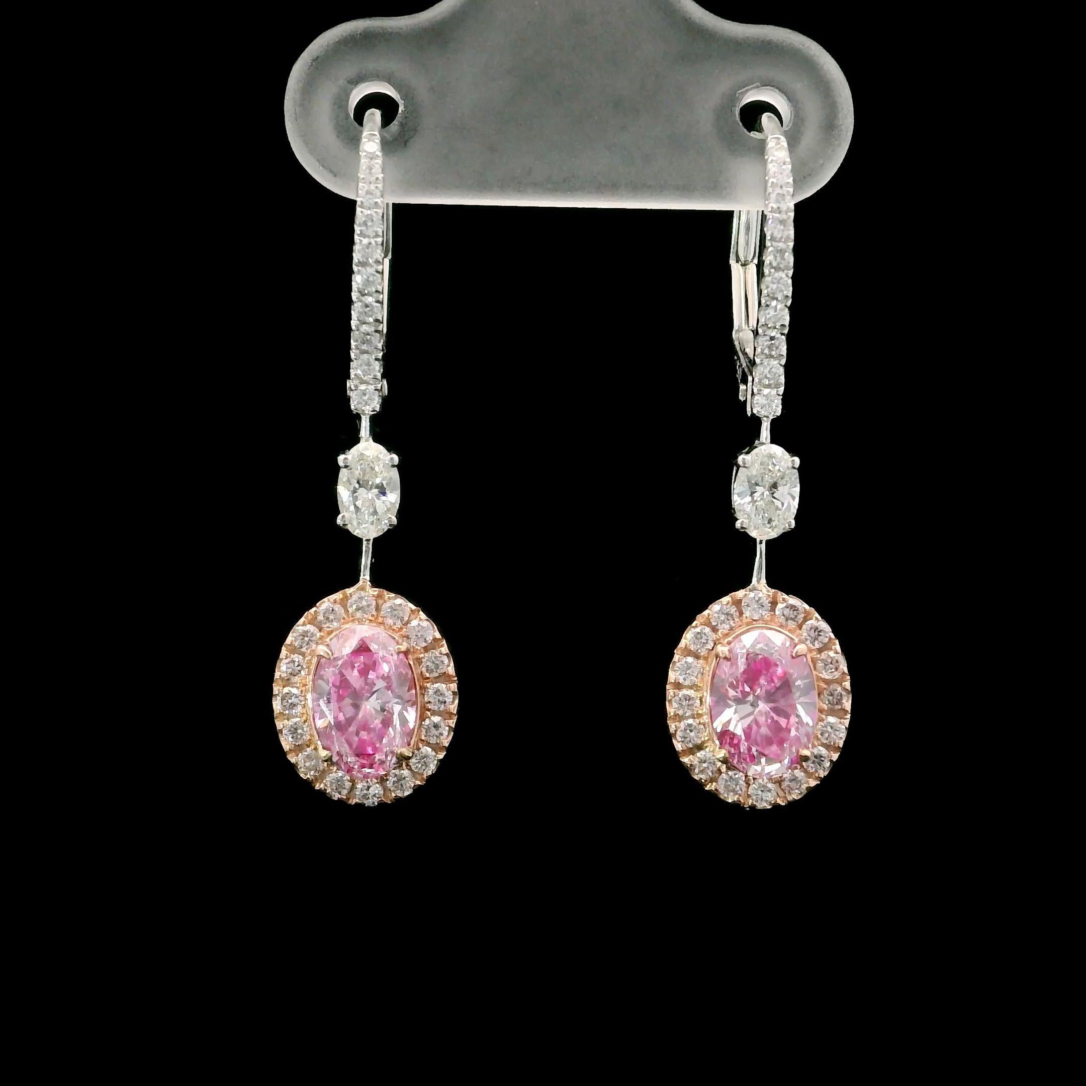 18kt white gold Earrings with diamonds
  
  Gold colour & karat: White gold 18kt
  Weight: 2.63 grams
  
  Set with-
  Stone type: Diamonds
  Shape: Oval / Oval
  Carat: 0.52 / 0.50
  Colour: Faint Pinkish Brown / Faint Pinkish Brown
  Clarity: VS2