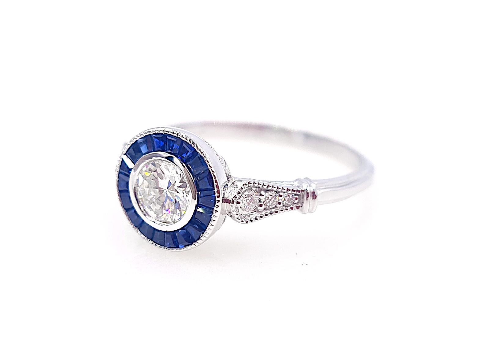Art Deco GIA Certified 0.52 Carat D VS2 Old Cut Diamond Sapphire Halo White Gold Ring