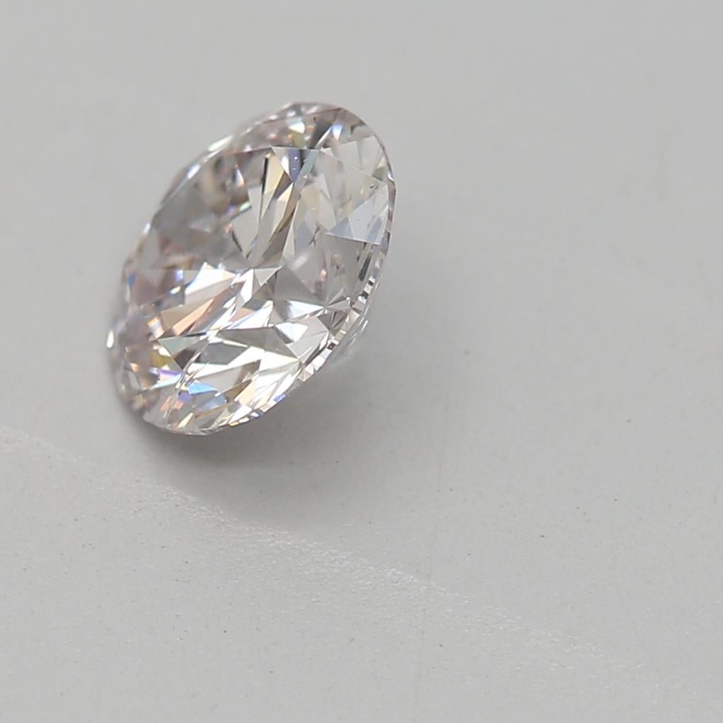 Round Cut GIA Certified 0.52 Carat Faint Pink SI2 Clarity Diamond For Sale