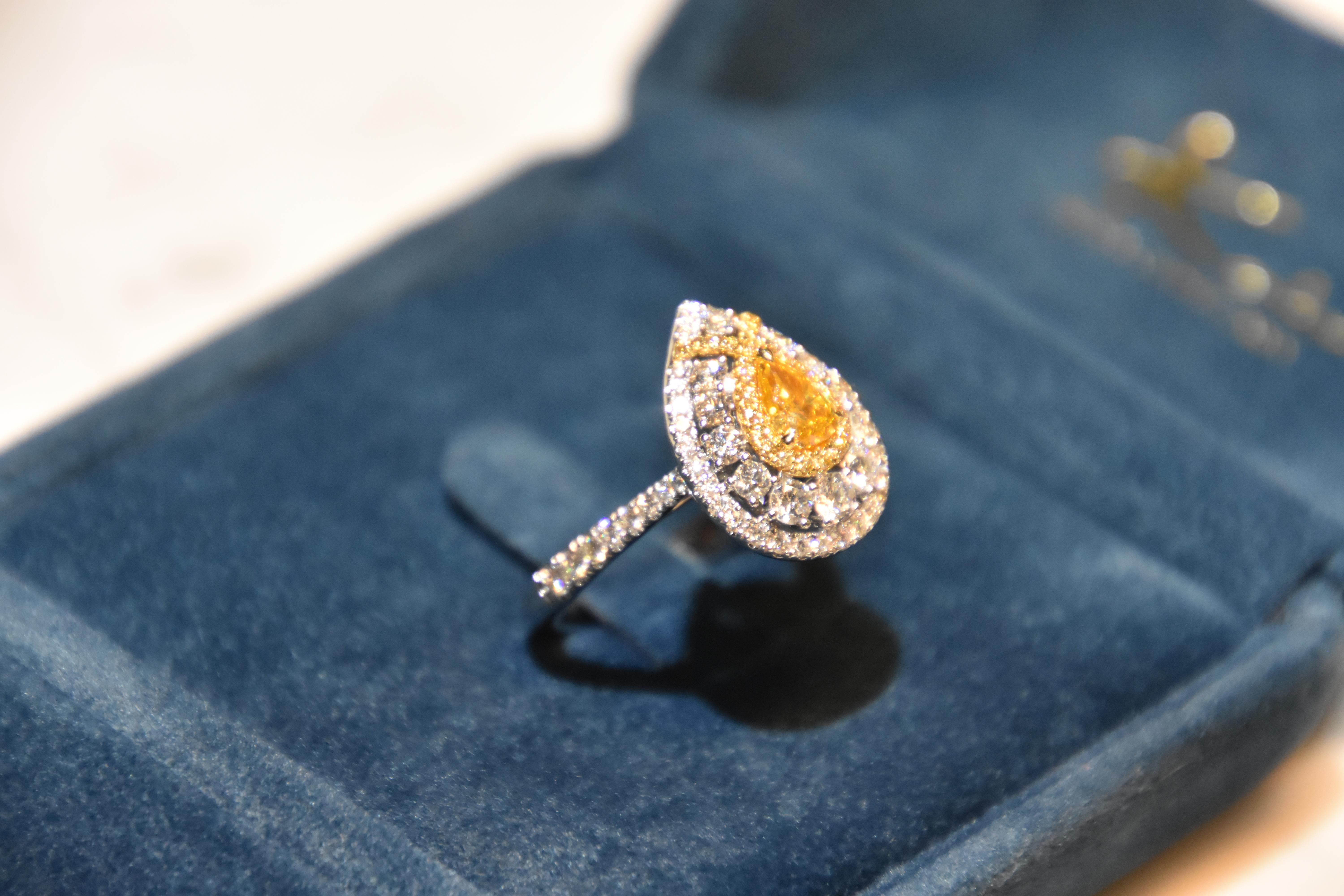 Women's GIA Certified 0.52 Carat Fancy Intense Yellow- Orange Diamond Ring For Sale