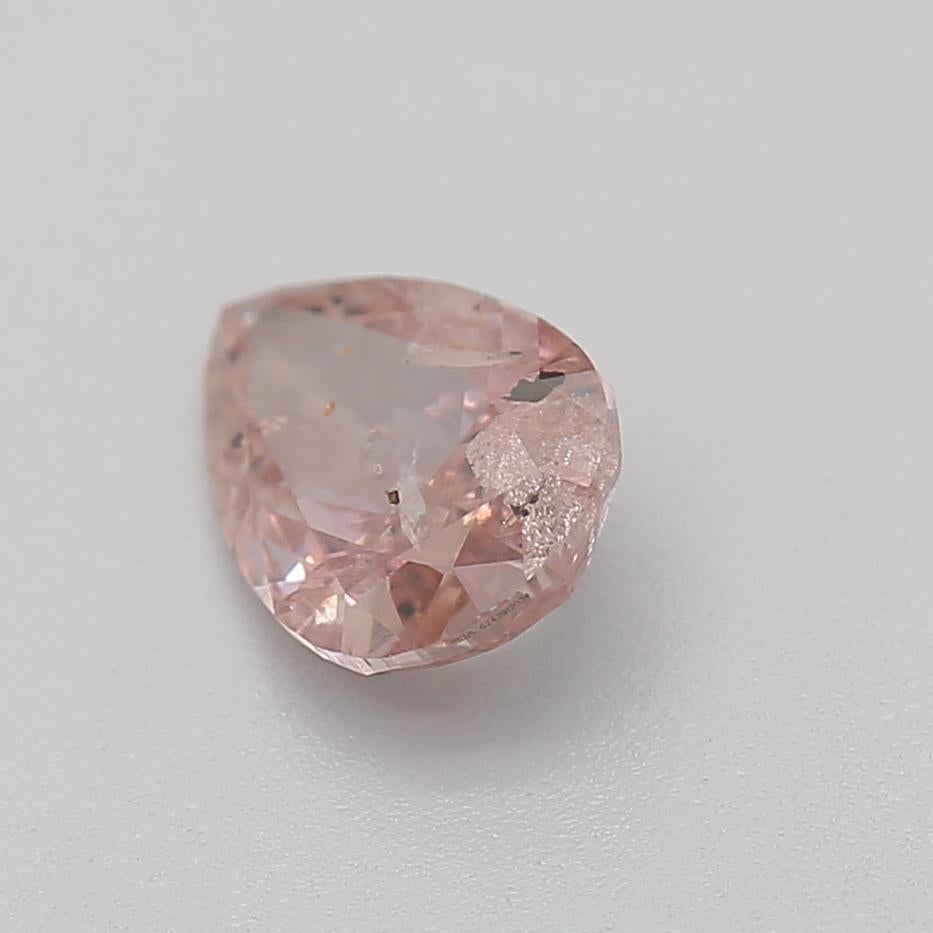 Pear Cut GIA Certified 0.52 Carat Fancy Orangy Pink I2 Clarity Diamond For Sale