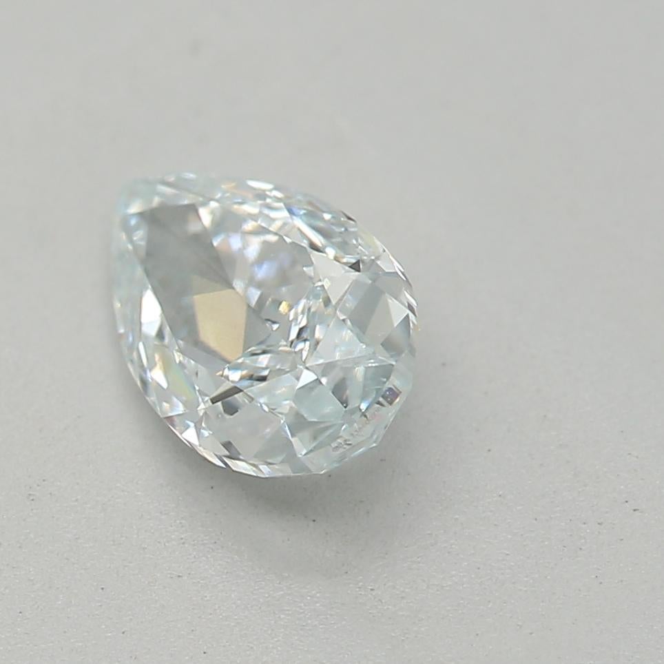 Pear Cut GIA Certified 0.52 Carat Light Blue SI2 Clarity Diamond For Sale