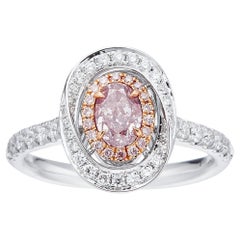 GIA Certified, 0.52ct Natural Fancy Brownish Pink Oval Shaped Diamond Ring 18KT.