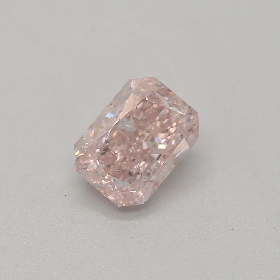 Certificate: GIA 
Report Number: 7402095697
Shape And Cut: Radiant
Carat Weight: 0.53 carat
Measurements: 5.10 x 3.77 x 2.79 mm
Color Grade: Fancy Light Orangy Pink

FEATURES OF THE DIAMOND:

This fancy light orangy pink diamond is a rare and