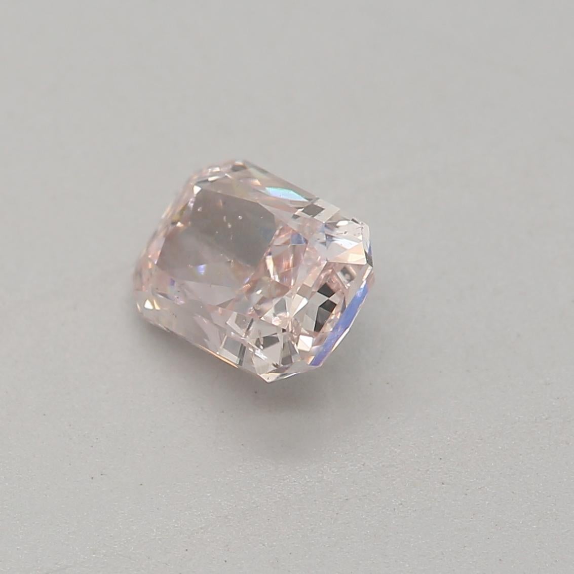 Radiant Cut GIA Certified 0.53 Carat Fancy Light Orangy Pink SI2 Clarity Diamond For Sale