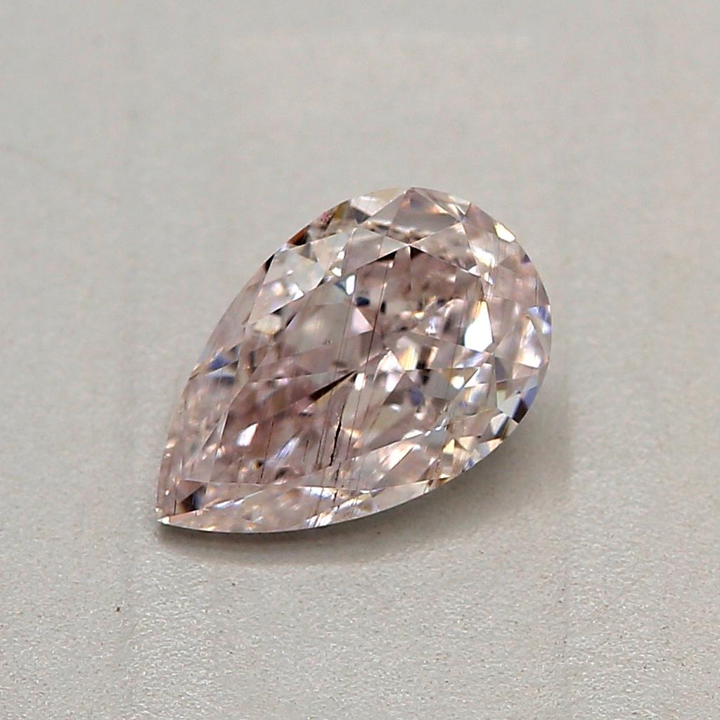 Certificate: GIA
Report Number: 6472712429
Shape And Cut: Pear
Carat Weight: 0.53 carat
Measurements: 6.64 x 4.26 x 2.64 mm
Color Grade: Light Pink

This light pink diamonds are a subset of the fancy color diamond category, known for their delicate