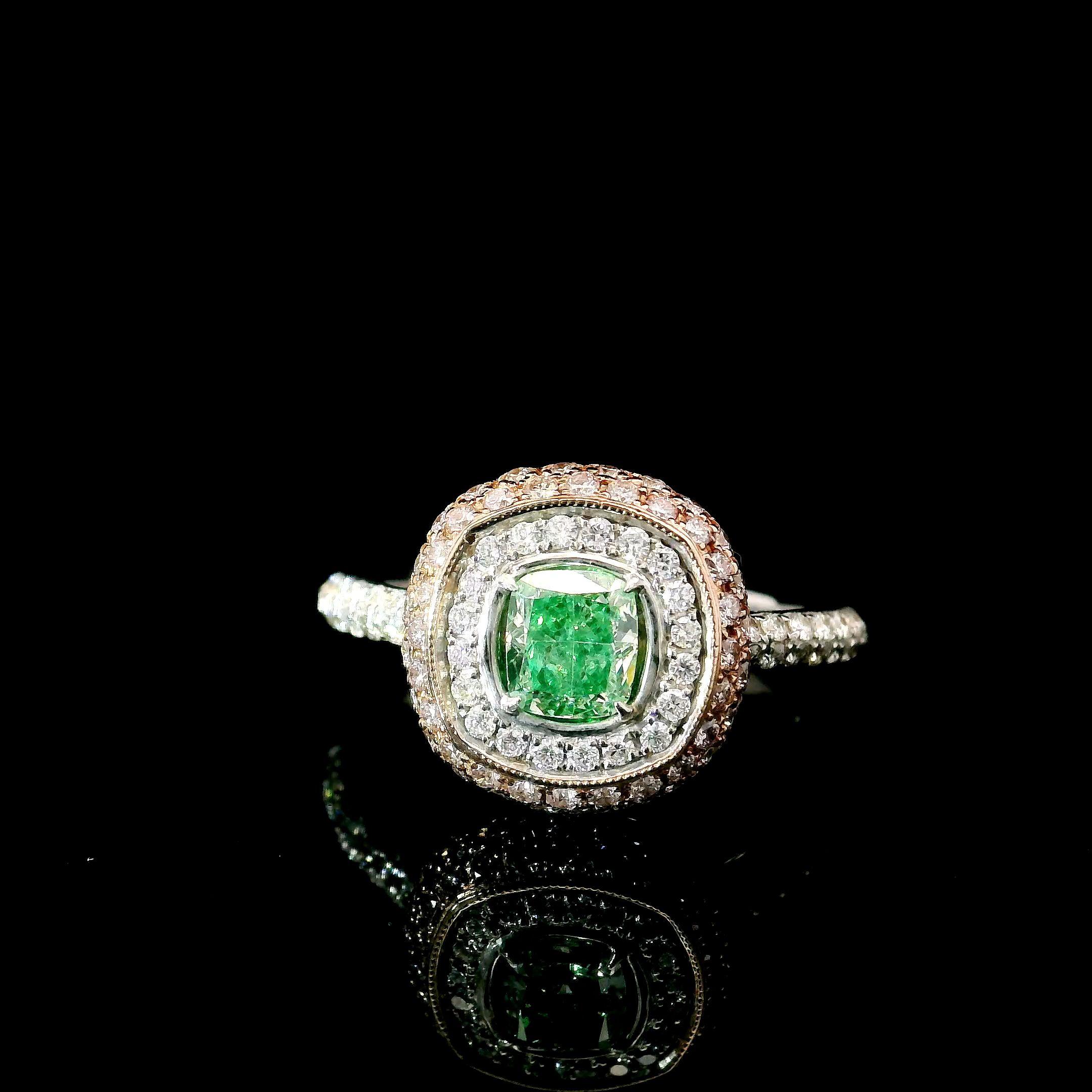 18kt white gold ring with diamonds
  
  Gold colour & karat: White gold 18kt
  Weight: 4.52 grams
  
  Set with-
  Stone type: Diamonds
  Shape: Cushion
  Carat: 0.54 ct
  Colour: Fancy Light Yellow Green 
  Clarity: VS2
  
  Surrounding Stones: